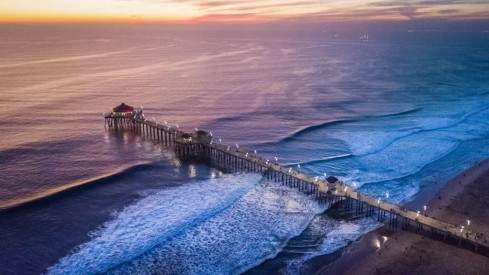 From the land: aerial view of Huntington Beach Pier at sunset