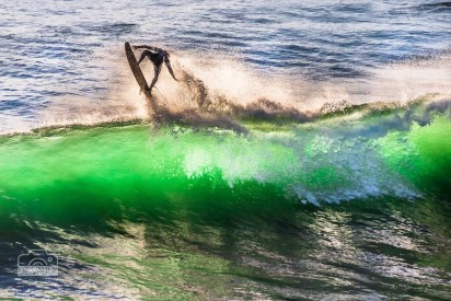 Jumping on the green wave: surf, wave, jump